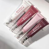 All four Caratkey lip essence shades with clear caps