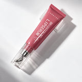 Peach Blossom Caratkey lip essence capped tube on acrylic